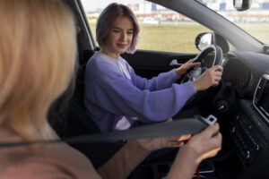 woman taking her driver s license test vehicle